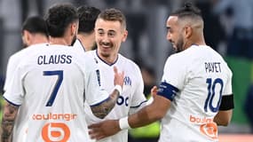 Le Marseillais Valentin Rongier tout sourire avec Dimitri Payet et Jonathan Clauss
