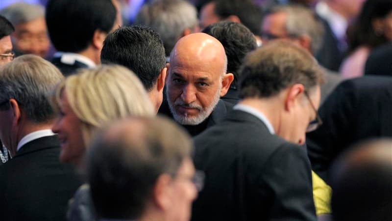 Le président afghan Hamid Karzaï, à Chicago. Les membres de l'Otan ont convenu de transférer aux forces afghanes la responsabilité des opérations de combat à la mi-2013. Le communiqué final du sommet de Chicago précise que l'Alliance ne fera plus que form