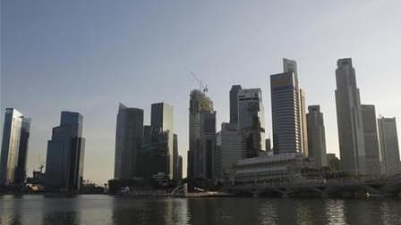 Vue de Singapour. Les villes devraient jouer un plus grand rôle dans la lutte contre le réchauffement climatique mondial, et elles peuvent agir dans ce domaine plus facilement que les Etats, lesquels peinent à s'entendre sur un nouveau traité internationa