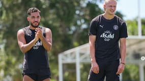 Rayan Cherki et Erling Haaland