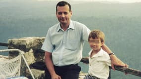 Le juge Borrel, avec son enfant, dans une photo non datée. 