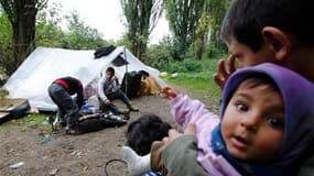 Famille de Roms installée dans une tente à Villeneuve-d'Ascq, dans le Nord. Pour la commissaire européenne à la Justice, Viviane Reding, la politique de la France envers les Roms est une honte et l'Union européenne pourrait lancer prochainement une procéd
