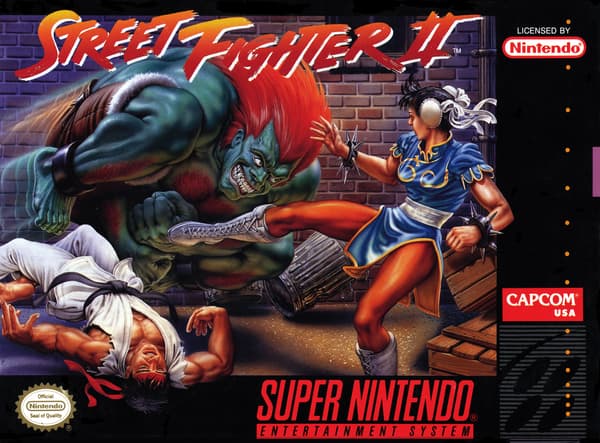 La pochette du jeu "Street Fighter II" par Mick McGinty, mettant en scène Chun-Li (à droite).