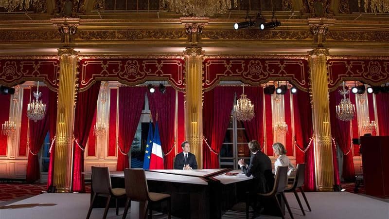 Nicolas Sarkozy a quasiment levé dimanche les derniers doutes qui pesaient sur sa candidature à l'élection présidentielle du printemps en déclarant qu'il ne se déroberait pas à son "rendez-vous avec les Français", lors de son intervention télévisée. /Phot
