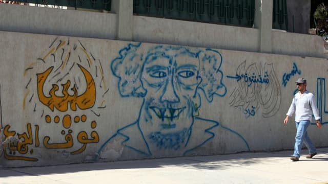 Graffiti de Mouammar Kadhafi, à Syrte, le 13 octobre 2012.