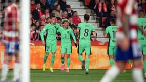 Antoine Griezmann et Alvaro Morata célèbre le but de la victoire lors de Grenade-Atlético (0-1, Liga), le 22 janvier 2024