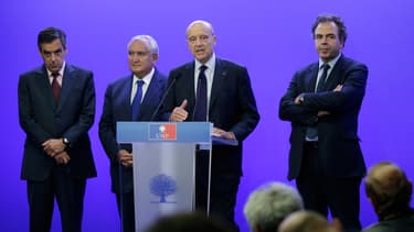 François Fillon, Jean-Pierre Raffarin et Alain Juppé, le 8 juillet 2014, à Paris.