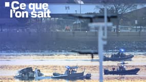Les secours mobilisés après la collision entre un avion d'une filiale régionale d'American Airlines et un hélicoptère militaire, à Washington DC, le 