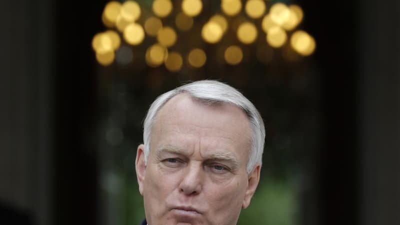 Jean-Marc Ayrault a demandé à l'UMP de clarifier sa position vis-à-vis du Front national, au lendemain de la victoire d'un candidat du principal parti d'opposition lors de la législative partielle de Villeneuve-sur-Lot. /Photo prise le 14 juin 2013/REUTER