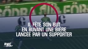 Il fête son but en buvant une bière lancée par un supporter