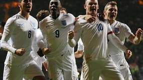 Chris Smalling, Danny Welbeck, Wayne Rooney et Jack Wilshere (de gauche à droite)