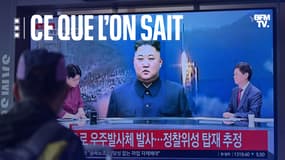 Un homme regarde un écran de télévision diffusant un bulletin d'information avec des images du dirigeant nord-coréen Kim Jong Un, à la gare de Séoul, le 31 mai 2023, le jour où la Corée du Nord a lancé un satellite qui s'est abîmé en mer.