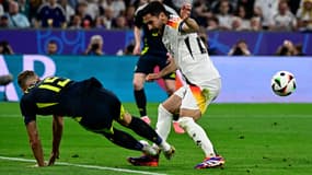 Le tacle de Porteous sur Gündogan lors de Allemagne-Ecosse le 14 juin 2024