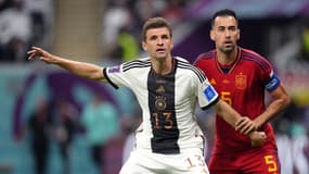 Thomas Müller et Sergio Busquets