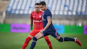 Julian Draxler devant Lucas Ocampos lors du match PSG-Séville, à Faro (Portugal) le 27 juillet 2021