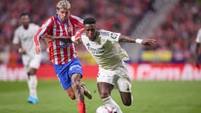 Rodrigo De Paul et Vinicius Junior lors d'Atlético-Real Madrid, le 29 septembre 2024