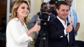 Le président Enrique Pena Nieto et son épouse à la sortie d'un bureau de vote à Mexico le 7 juin.