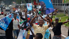 Des partisans de Joseph Kabila célèbrent la victoire de leur candidat à la présidentielle du 28 novembre en République démocratique du Congo. Des résultats provisoires officiels ont donné la victoire au président sortant mais l'opposant Etienne Tshisekedi