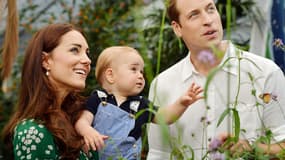 La duchesse et le duc de Cambridge avec leur fils, à Londres, pour le premier anniversaire du prince héritier, le 27 juillet 2014.