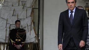 François Fillon à la sortie du dernier conseil des ministres du gouvernement sortant, mercredi à l'Elysée. Après cinq années passées à Matignon, François Fillon a fait remettre jeudi la démission de son gouvernement à Nicolas Sarkozy, quatre jours après l