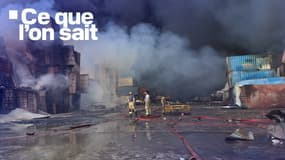 Des pompiers et des sauveteurs travaillent sur les lieux d'une explosion qui a eu lieu un jour plus tôt au quai du port Shahid Rajaï en Iran, le 27 avril 2025.