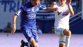 Krasic ici à la lutte avec Thauvin