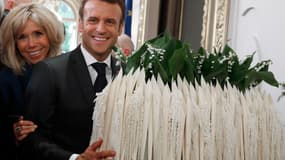 Emmanuel et Brigitte Macron lors du 1er mai 2019, au palais de l'Elysée.