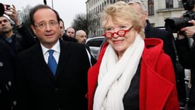 François Hollande et Eva Joly, se sont croisés jeudi matin sur le quai de la gare de Nantes, où les amenaient leurs campagnes respectives. /Photo prise le 19 janvier 2012/REUTERS/Stéphane Mahe