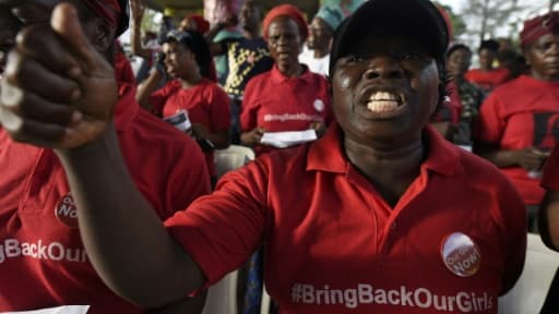 Une femme réclame la libération des filles de Chibok encore aux mains des islamistes de Boko Haram, le 13 avril 2018 à Lagos. Une femme réclame la libération des filles de Chibok encore aux mains des islamistes de Boko Haram, le 13 avril 2018 à Lagos.