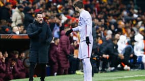 Xavi avec Gerard Piqué au Barça, le 19 mars 2022