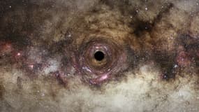 Vue d'artiste d'un trou noir qui courbe le trajet de la lumière passant à proximité, dans le phénomène de lentille gravitationnelle, dans une photo fournie par l'ESA le 10 juin 2022