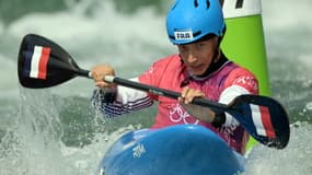 Le Français Titouan Castryck lors de son 8e de finale de l'épreuve de kayak cross des JO-2024 à Vaires-sur-Marne, le 4 août 2024