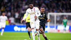 Maitland-Niles et Akieme lors de Lyon-Reims, le 30 mars 2024