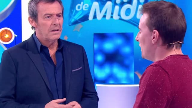 Jean-Luc Reichmann, face à Adrien, candidat et ex-paraplégique.