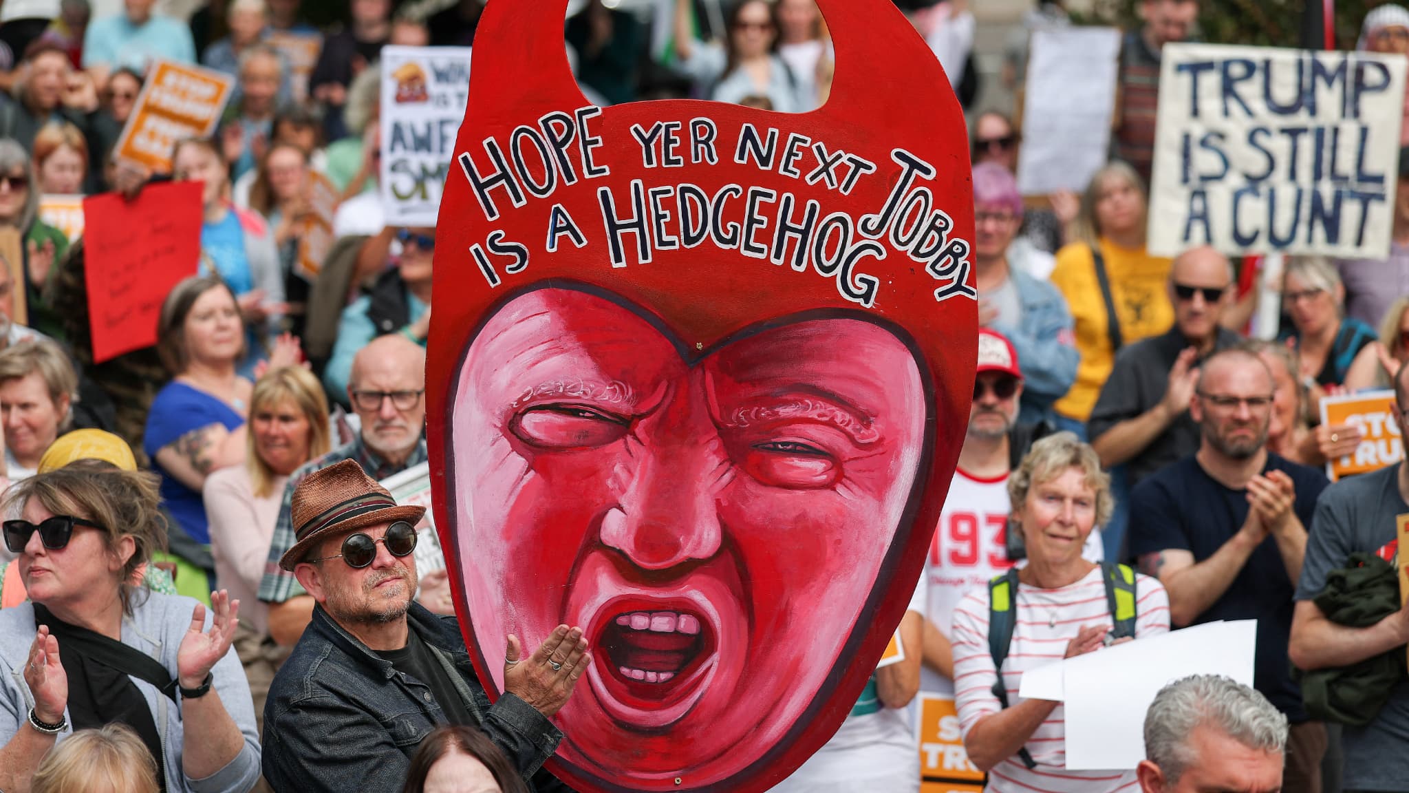 Blanden signs protesters during a demonstration of the Blanden signs protesters during a demonstration of the