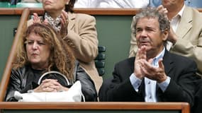 Le chanteur Pierre Perret et son épouse Rebecca à Roland Garros, le 24 Mai 2005
