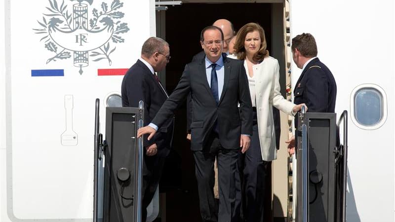 François Hollande à son arrivée sur le sol américain, à Chantilly, en Virginie. Le président français a souligné la convergence des intérêts entre les Etats-Unis et la France et a plaidé en faveur d'une politique de relance de la croissance lors de sa vis
