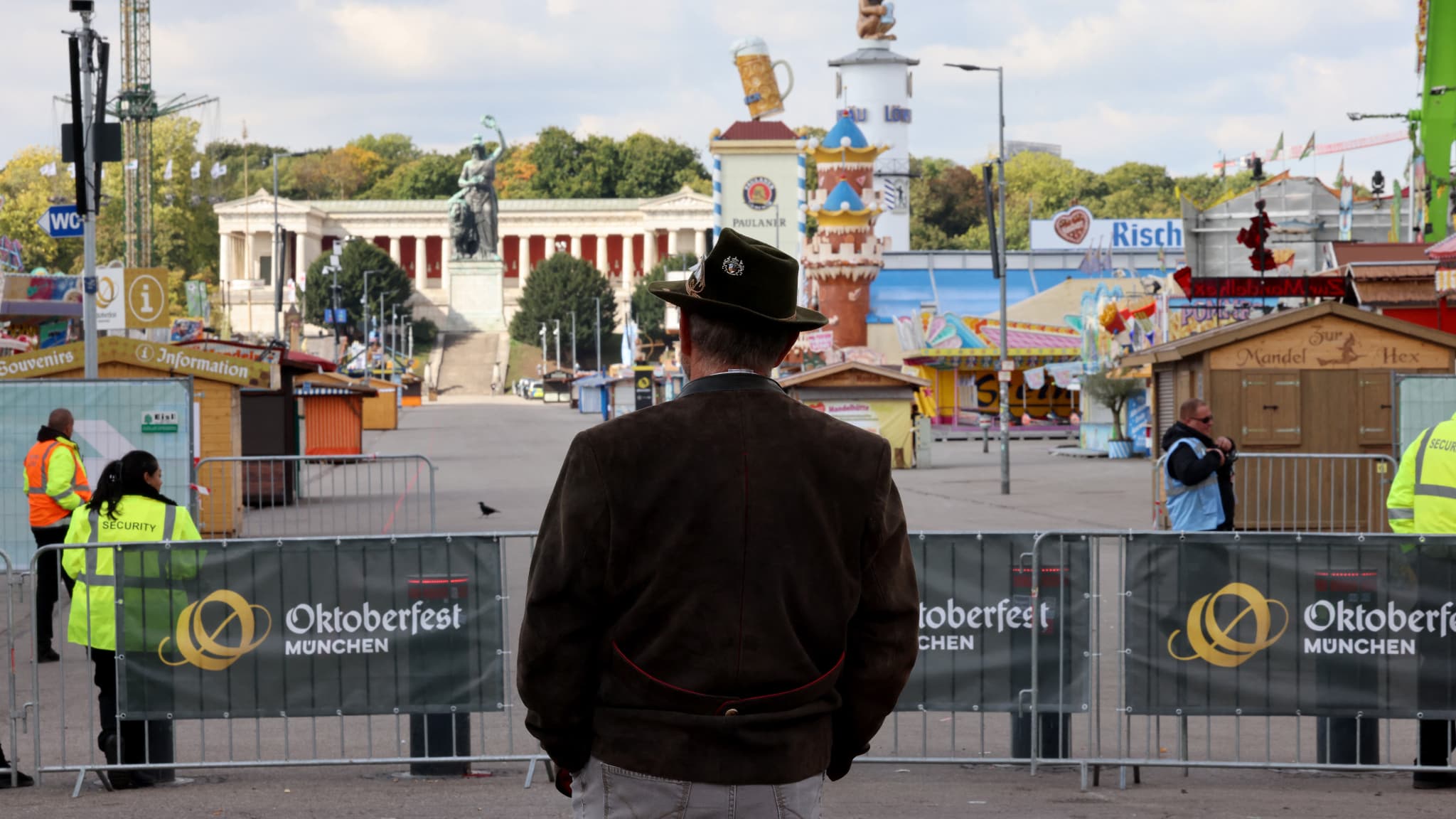 A man where the Oktoberfest beer party is generally celebrated in Munich, Germany, after the site is closed due to a bomb alert on October 1, 2025.