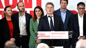 Le secrétaire national du Parti communiste français (PCF) Fabien Roussel prononce un discours lors d'une conférence de presse présentant le programme du nouveau pacte électoral du "Nouveau Front Populaire" entre les partis de gauche, à la Maison de la Chimie, à Paris, le 14 juin 2024.