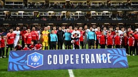 Les joueurs de l'US Revel (Régional 1) et du PSG avant leur 32e de finale de Coupe de France (0-9), le 7 janvier 2024