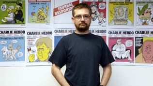 Charb, rédacteur en chef de Charlie Hebdo, pose à l'occasion de la sortie de sa bande dessinée intitulée « La Vie de Mahomet » à Paris (France), le 27 décembre 2012. (Photo d'illustration)