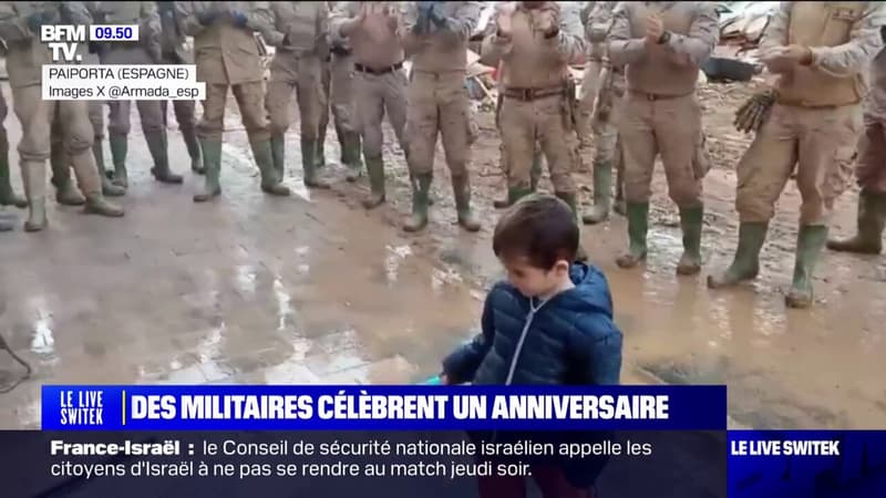 À Paiporta en Espagne, des militaires célèbrent l'anniversaire d'un petit garçon