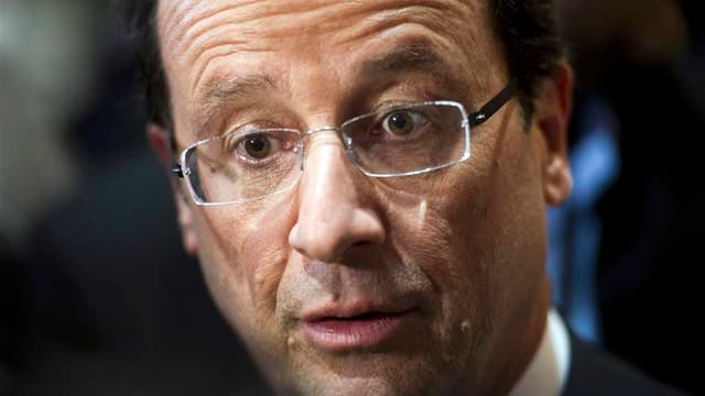 François Hollande a dénoncé samedi les "effets d'annonce" de Nicolas Sarkozy après les récentes tueries, estimant qu'il était inutile d'inventer de nouvelles lois pour lutter contre le terrorisme, comme le propose le président-candidat. /Photo d'archives/