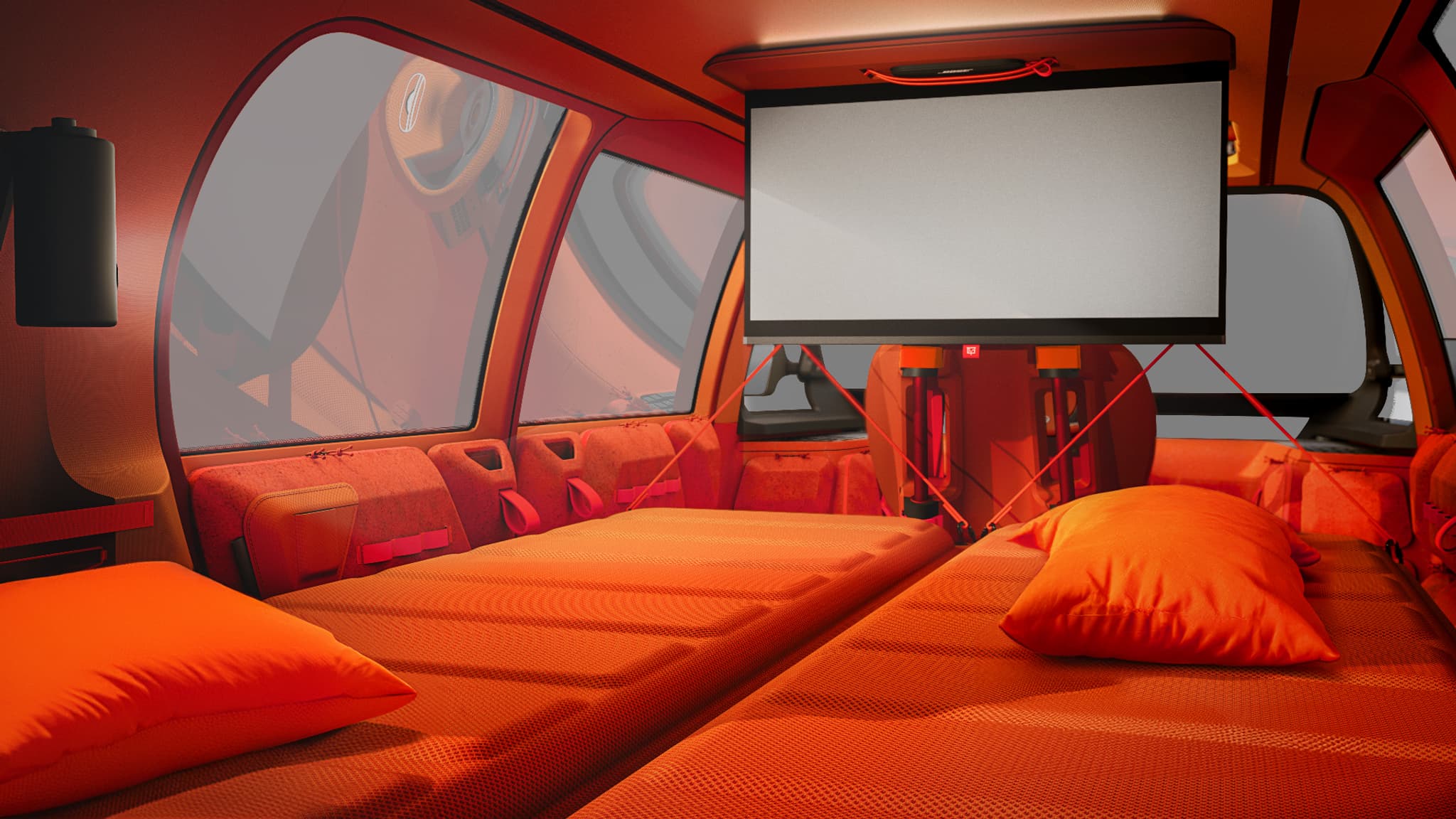 Deux matelas, un rétroprojecteur et son écran, à bord du concept Citroën ELO.
