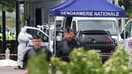 La gendarmerie et la police scientifique sur les lieux de l'attaque d'un convoi pénitentiaire au péage d'Incarville (Eure) le 14 mai 2024