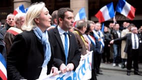 Marine Le Pen et Florian Philippot, lors du défilé du 1er mai du Front national, en 2013.
