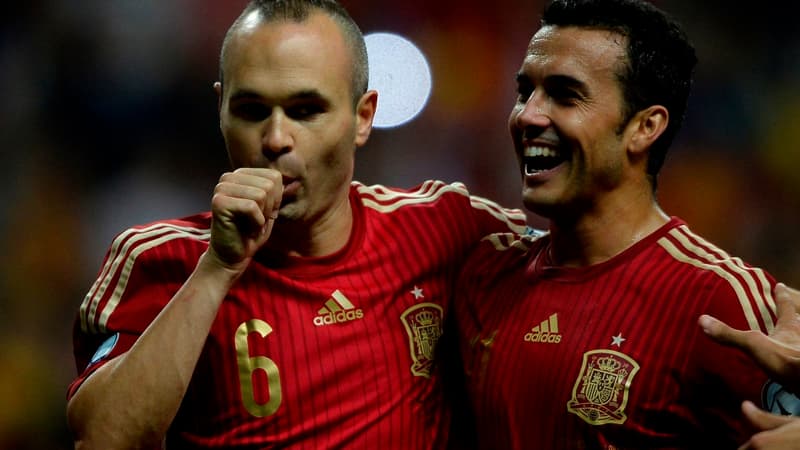 Andres Iniesta (à gauche), le métronome du milieu espagnol