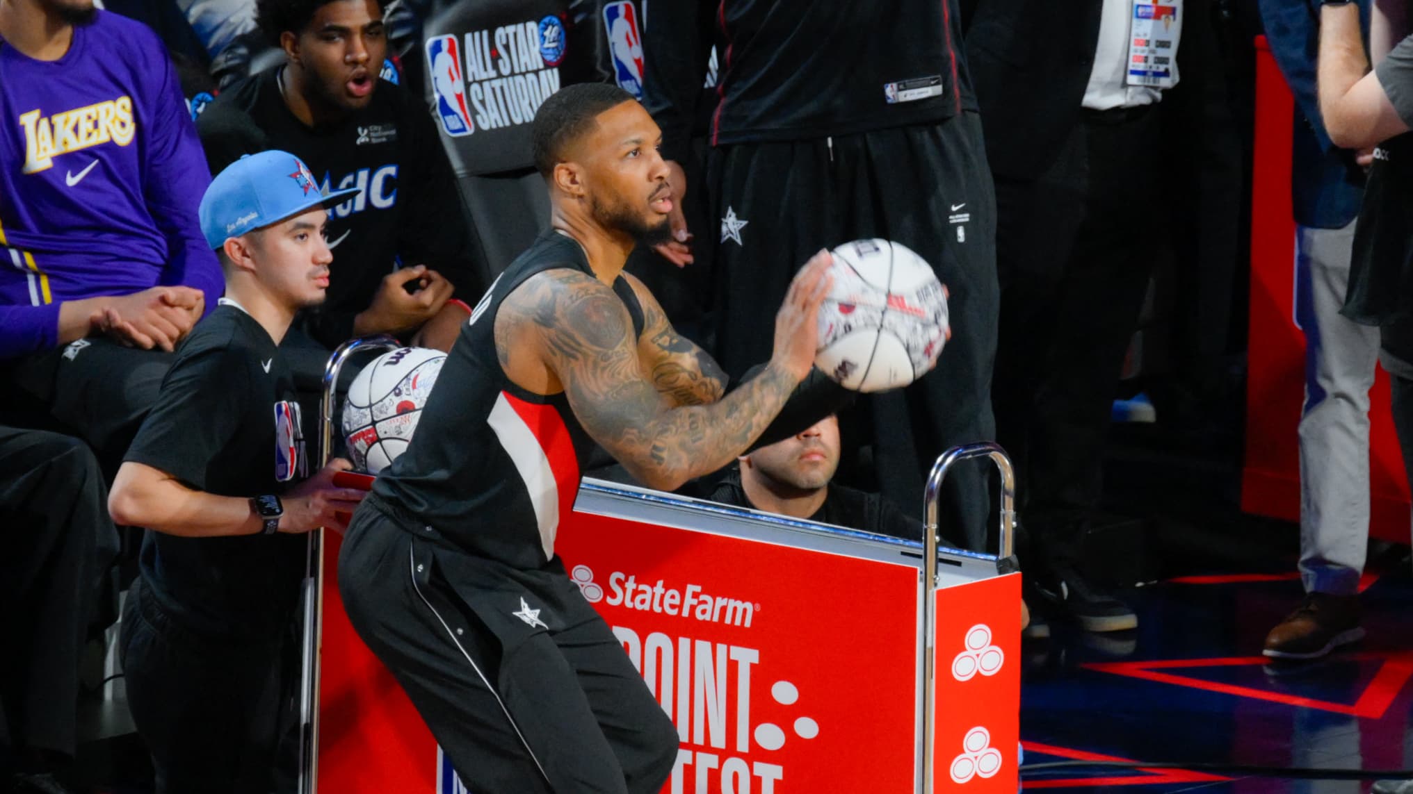 https://images.bfmtv.com/SosUj4aG5zzgKvSDtKi4e1-cY8c=/0x25:2032x1168/images/Damian-Lillard-lors-du-concours-de-tirs-a-trois-points-lors-du-All-Star-Game-le-14-fevrier-a-Los-Angeles-2235787.jpg