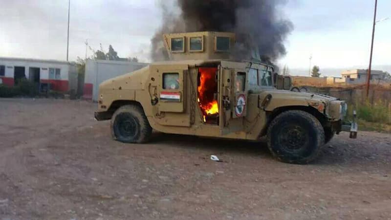 Un véhicule des forces de sécurité irakiennes à Mossoul, le 10 juin 2014.