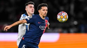 Marquinhos au duel avec un joueur de la Real Sociedad lors d'un match du PSG en Ligue des champions, le 14 février 2024